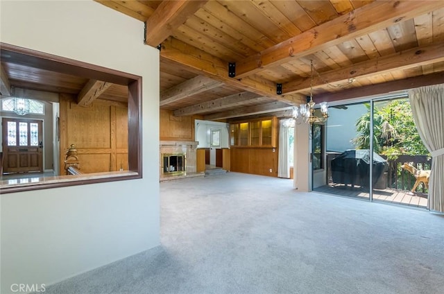 1835 Las Flores Dr, Glendale, CA 91207 - unfurnished living room featuring a wood ceiling with exposed beams, a chandelier, carpet, and a fireplace with raised hearth