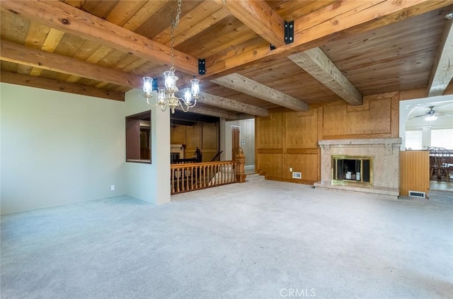 1835 Las Flores Dr, Glendale, CA 91207 - unfurnished living room with a wooden ceiling with exposed beams, a chandelier, carpet floors, ceiling fan, and a fireplace
