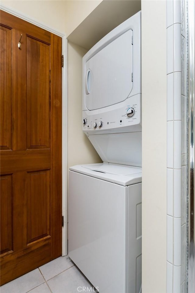 1835 Las Flores Dr, Glendale, CA 91207 - laundry area with stacked washer and clothes dryer and light tile patterned flooring