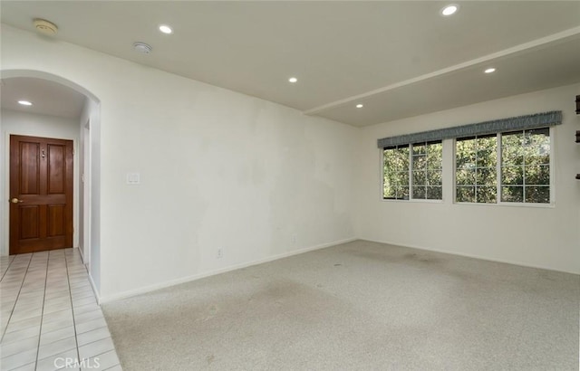 1835 Las Flores Dr, Glendale, CA 91207 - spare room featuring arched walkways, recessed lighting, light carpet, and a smoke detector