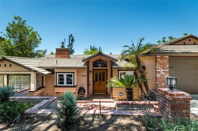 1835 Las Flores Dr, Glendale, CA 91207 - ranch-style house featuring a chimney and an attached garage