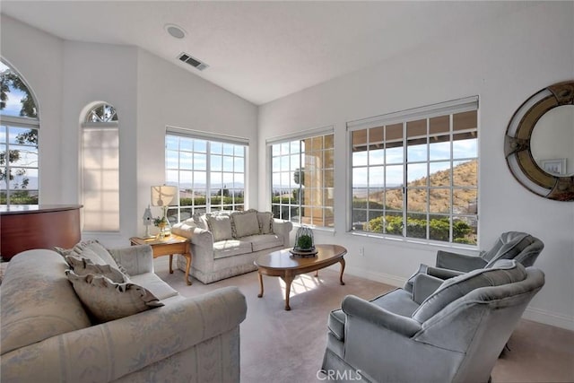 18032 Ohna Rd, Apple Valley, CA 92307 - carpeted living room with baseboards and lofted ceiling