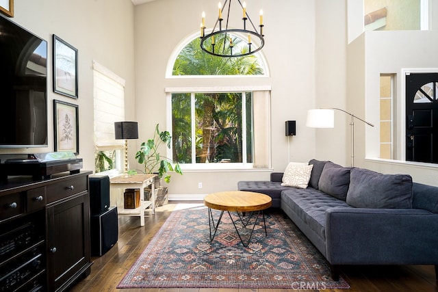 17 Springbrook Rd, Laguna Niguel, CA 92677 - living area featuring dark wood finished floors, a high ceiling, and a chandelier