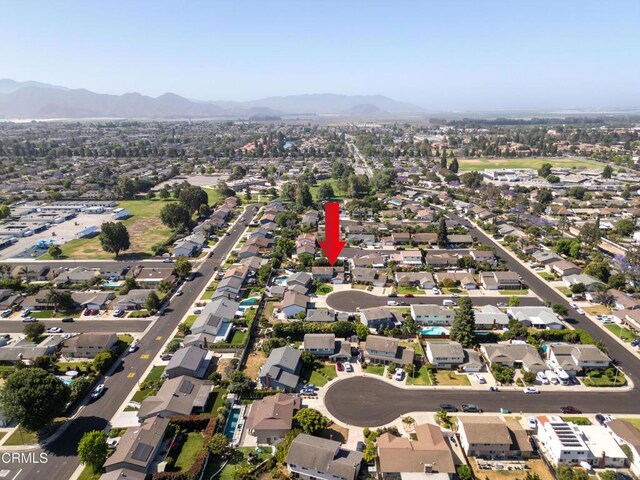 1584 Prima Ct, Camarillo, CA 93010 - aerial overview of property's location featuring mountains and nearby suburban area