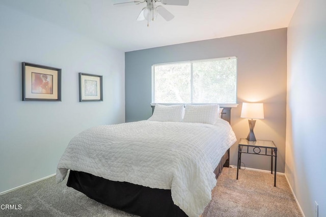 1584 Prima Ct, Camarillo, CA 93010 - carpeted bedroom with baseboards and ceiling fan
