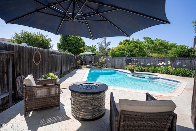 1584 Prima Ct, Camarillo, CA 93010 - view of pool with a patio, a fenced backyard, a pool with connected hot tub, and a fire pit