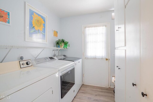 1584 Prima Ct, Camarillo, CA 93010 - laundry room with separate washer and dryer and light wood-style flooring