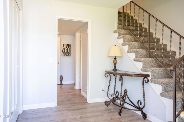 1584 Prima Ct, Camarillo, CA 93010 - staircase with wood finished floors