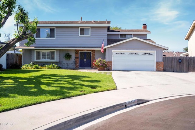 1584 Prima Ct, Camarillo, CA 93010 - traditional-style house featuring a chimney, an attached garage, concrete driveway, and brick siding