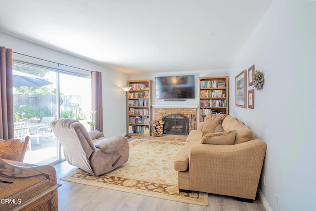 1584 Prima Ct, Camarillo, CA 93010 - living area with a fireplace and wood finished floors