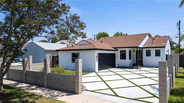 6832 Cantaloupe Ave, Van Nuys, CA 91405 - single story home featuring stucco siding, an attached garage, a shingled roof, concrete driveway, and a gate