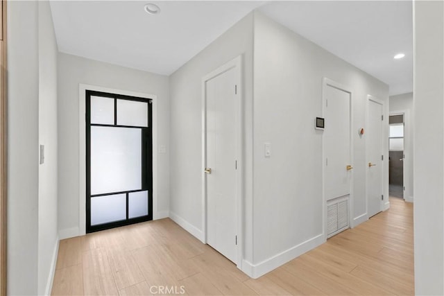 6832 Cantaloupe Ave, Van Nuys, CA 91405 - hall featuring light wood-type flooring and recessed lighting