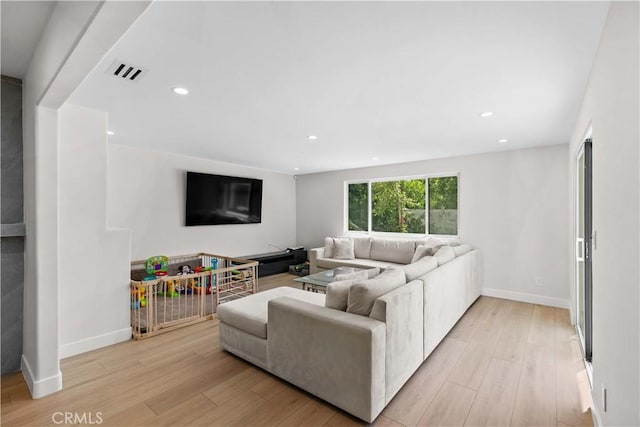 6832 Cantaloupe Ave, Van Nuys, CA 91405 - living room with light wood finished floors and recessed lighting