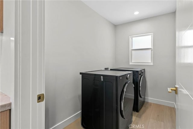 6832 Cantaloupe Ave, Van Nuys, CA 91405 - washroom featuring washer and clothes dryer, light wood-style floors, and recessed lighting