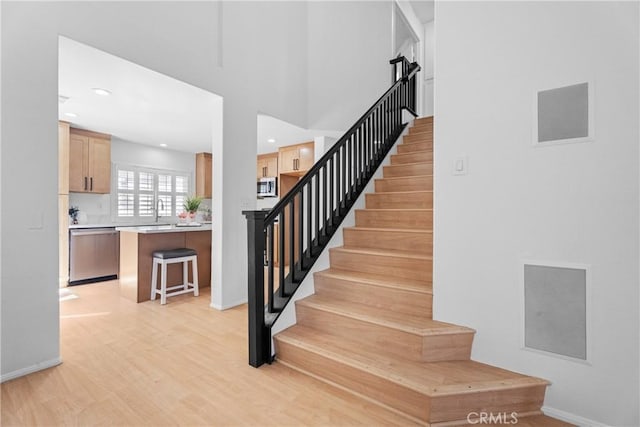2 Chestnut Dr, Aliso Viejo, CA 92656 - stairway featuring wood finished floors and recessed lighting