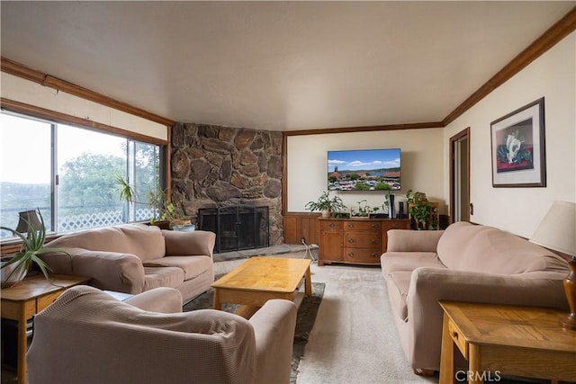 27786 Matterhorn Dr, Lake Arrowhead, CA 92352 - living room with a stone fireplace, light colored carpet, a wainscoted wall, and ornamental molding