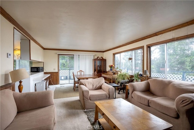 27786 Matterhorn Dr, Lake Arrowhead, CA 92352 - living area with light carpet, crown molding, and a wainscoted wall