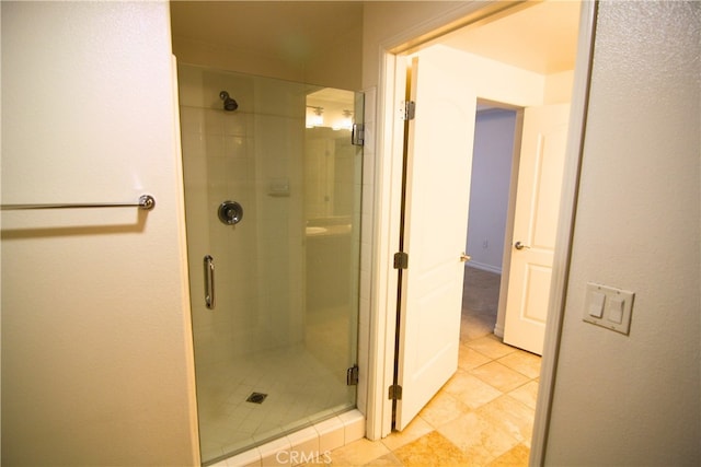629 Traction Ave Unit 508, Los Angeles, CA 90013 - bathroom featuring a shower stall and tile patterned floors