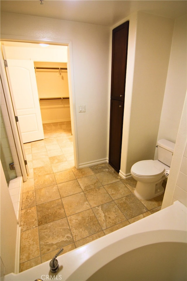 629 Traction Ave Unit 508, Los Angeles, CA 90013 - bathroom with a closet and stone finish floors