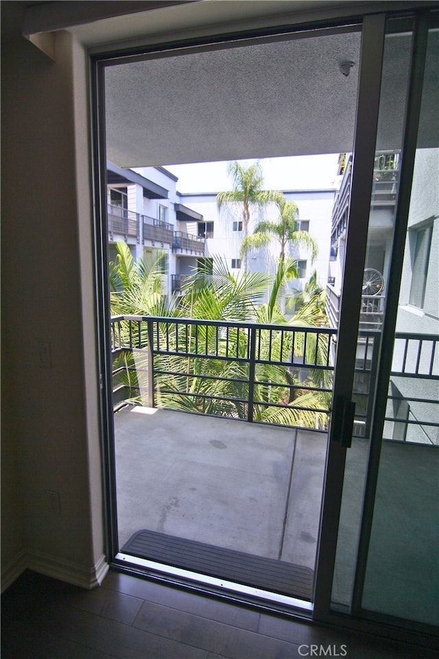 629 Traction Ave Unit 508, Los Angeles, CA 90013 - doorway to outside featuring baseboards