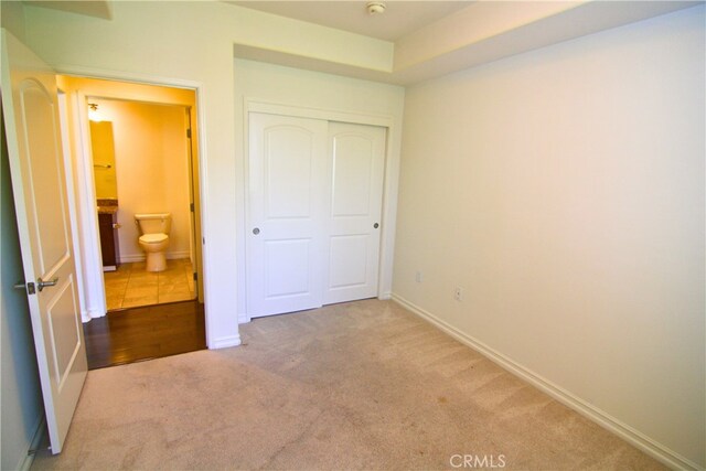 629 Traction Ave Unit 508, Los Angeles, CA 90013 - unfurnished bedroom with carpet flooring and a closet