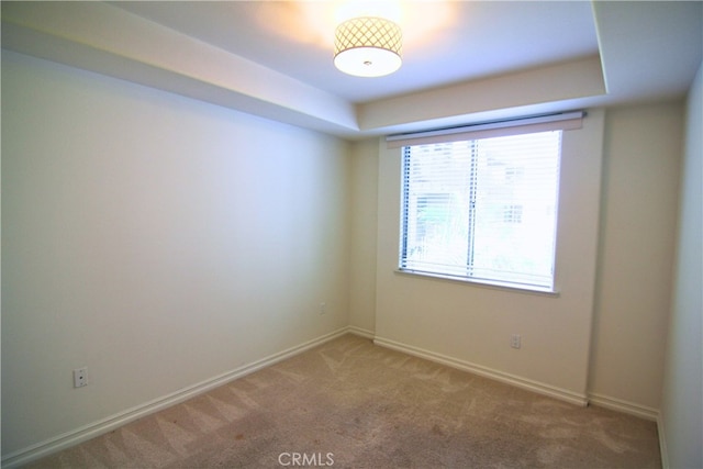 629 Traction Ave Unit 508, Los Angeles, CA 90013 - unfurnished room featuring light colored carpet and a raised ceiling