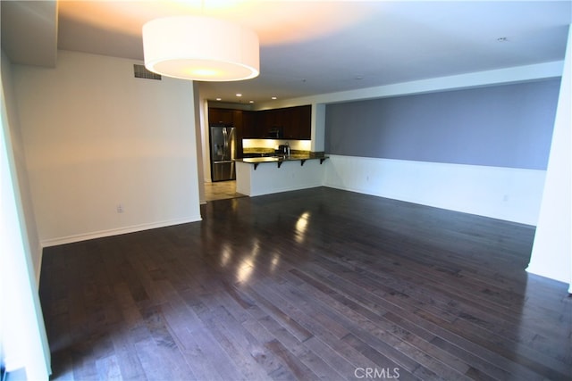 629 Traction Ave Unit 508, Los Angeles, CA 90013 - unfurnished living room with dark wood-style floors