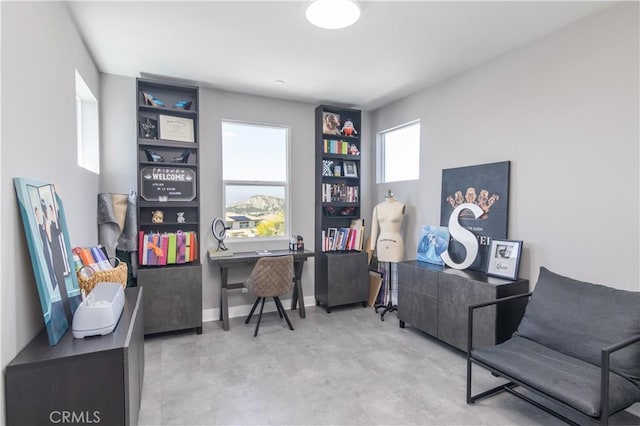 18824 Juniper Springs Dr, Canyon Country, CA 91321 - home office with concrete flooring and baseboards