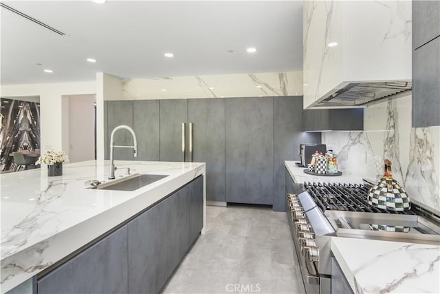 18824 Juniper Springs Dr, Canyon Country, CA 91321 - kitchen featuring modern cabinets, range, custom exhaust hood, gray cabinetry, and recessed lighting