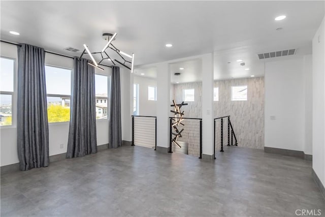 18824 Juniper Springs Dr, Canyon Country, CA 91321 - garage featuring recessed lighting and baseboards