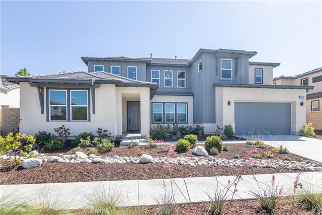 18824 Juniper Springs Dr, Canyon Country, CA 91321 - prairie-style house featuring concrete driveway and stucco siding