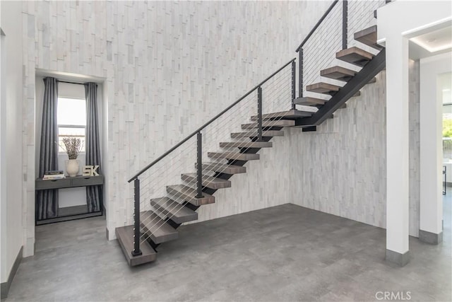 18824 Juniper Springs Dr, Canyon Country, CA 91321 - stairway with finished concrete floors and a high ceiling