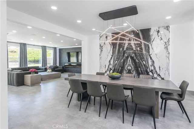 18824 Juniper Springs Dr, Canyon Country, CA 91321 - dining room with recessed lighting, concrete floors, and an accent wall