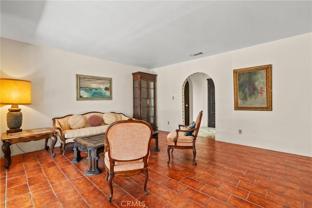 31039 Hasley Canyon Rd, Castaic, CA 91384 - sitting room with arched walkways and tile patterned floors