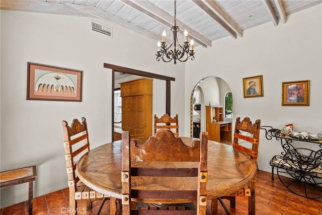 31039 Hasley Canyon Rd, Castaic, CA 91384 - dining space with arched walkways, a wood ceiling with exposed beams, and a chandelier