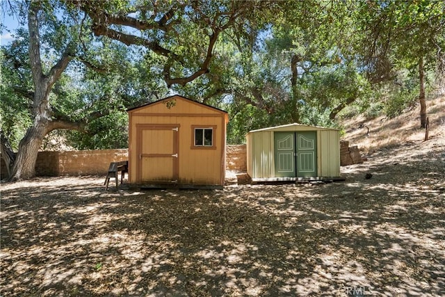31039 Hasley Canyon Rd, Castaic, CA 91384 - view of shed featuring a fenced backyard