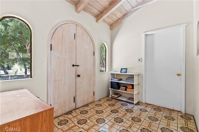 31039 Hasley Canyon Rd, Castaic, CA 91384 - entrance foyer with healthy amount of natural light, wood ceiling, and arched walkways