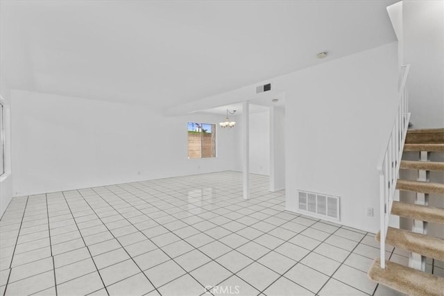 10473 Smoke River Ct, Fountain Valley, CA 92708 - below grade area with stairs, a chandelier, and light tile patterned floors