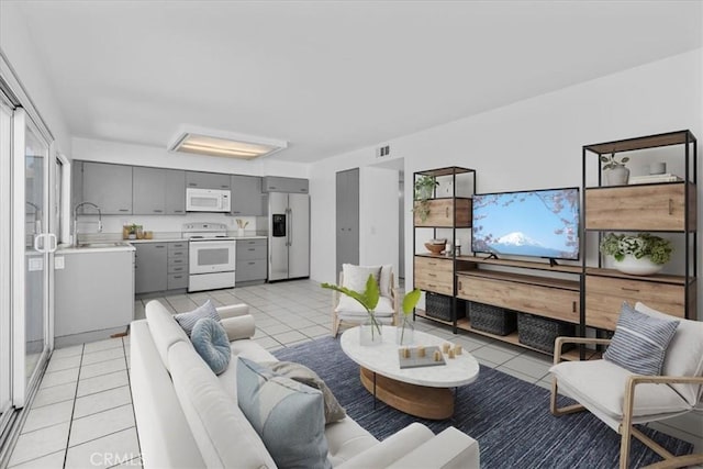 10473 Smoke River Ct, Fountain Valley, CA 92708 - living room featuring light tile patterned floors