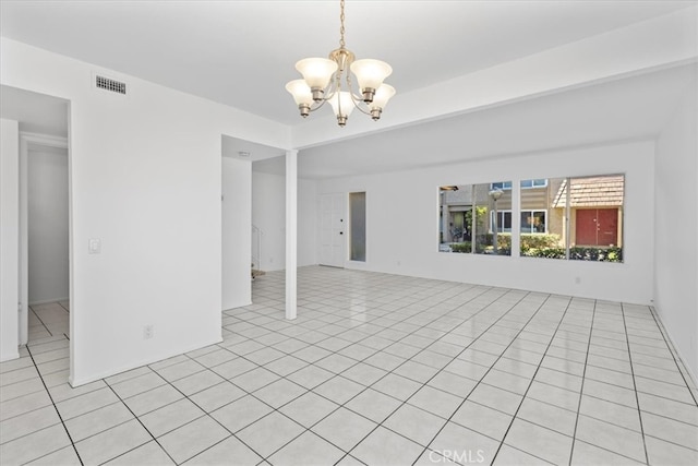 10473 Smoke River Ct, Fountain Valley, CA 92708 - empty room with a chandelier and light tile patterned floors