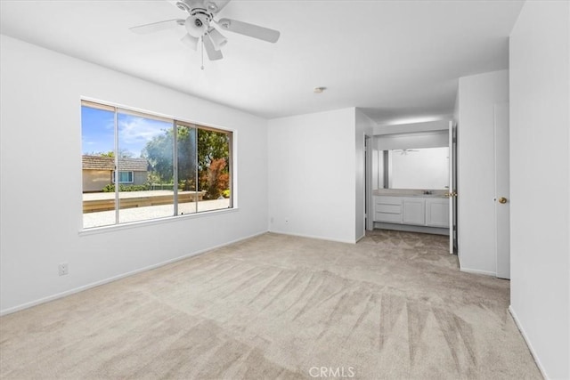 10473 Smoke River Ct, Fountain Valley, CA 92708 - unfurnished bedroom with light carpet and a ceiling fan