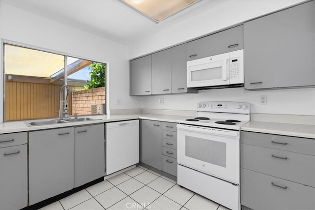 10473 Smoke River Ct, Fountain Valley, CA 92708 - kitchen featuring white appliances, gray cabinets, and light countertops