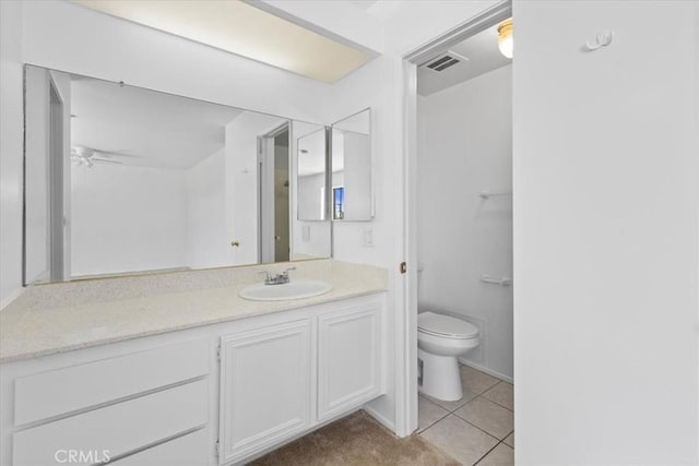 10473 Smoke River Ct, Fountain Valley, CA 92708 - bathroom featuring vanity, tile patterned flooring, and a ceiling fan
