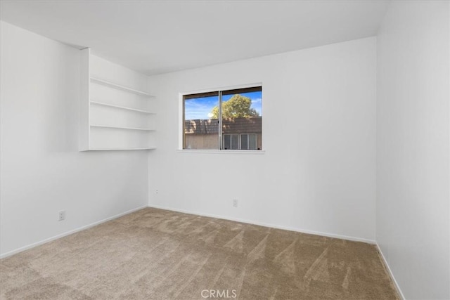 10473 Smoke River Ct, Fountain Valley, CA 92708 - carpeted spare room with baseboards
