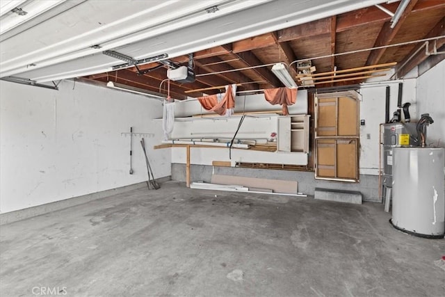 10473 Smoke River Ct, Fountain Valley, CA 92708 - garage featuring water heater, a garage door opener, and electric water heater