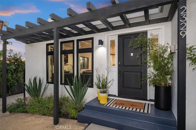 2329 Vineyard Ave, Los Angeles, CA 90016 - exterior entry at dusk with stucco siding