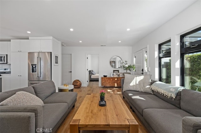 2329 Vineyard Ave, Los Angeles, CA 90016 - living room featuring recessed lighting and light wood-type flooring