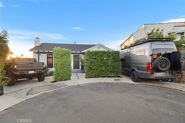 2329 Vineyard Ave, Los Angeles, CA 90016 - view of front of home with a chimney