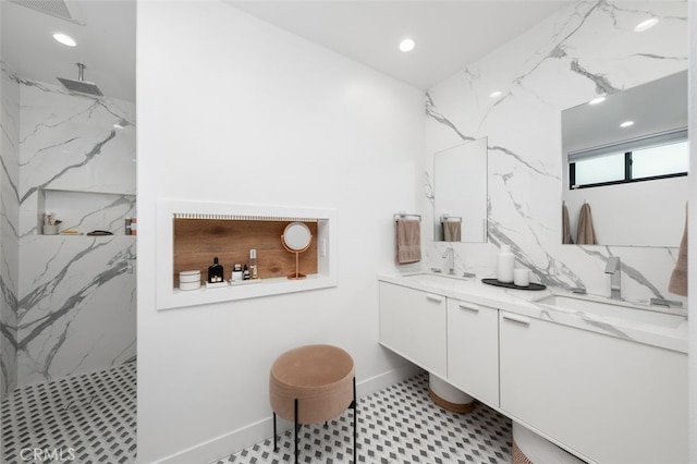 2329 Vineyard Ave, Los Angeles, CA 90016 - full bath featuring double vanity, a marble finish shower, and recessed lighting