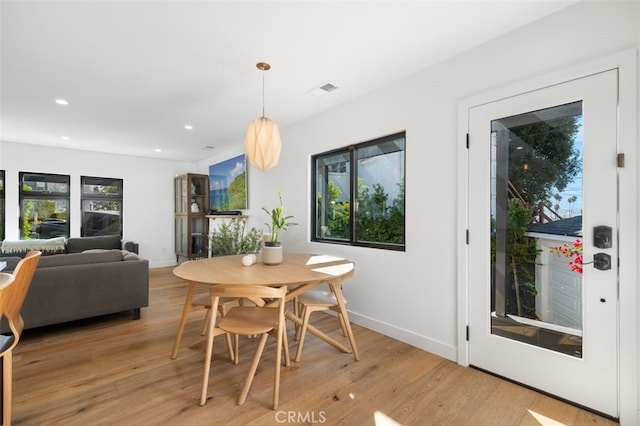2329 Vineyard Ave, Los Angeles, CA 90016 - dining room with plenty of natural light, light wood-type flooring, and recessed lighting